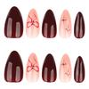 Red Almond-Shaped Press-On Nails with Bow and Star Design