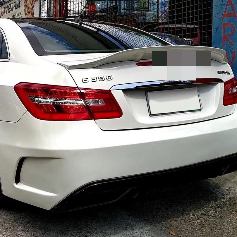 PD Style Body Kit for E-Class W207: Front Bumper, Rear Bumper, Side Skirts, Tailpipes.