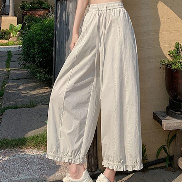 Women's Wide-Leg Ice Silk Pants: Dark Blue, Quick-Drying, High-Waist, Slimming, Lightweight Summer Lantern Style with Side Nine-Point Length.