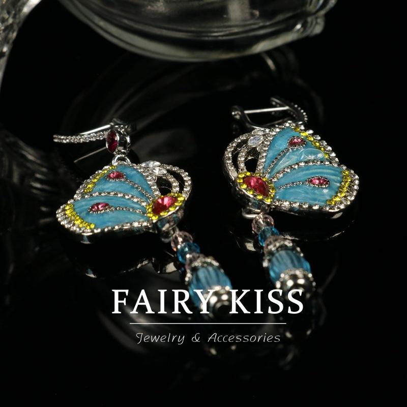 Exquisite Enamel Dripping Oil Full of Diamonds, Colorful Smart Butterfly Symmetrical Earrings, Fashionable Light Luxury and Elegant Earrings.
