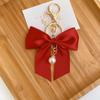Elegant Ribbon Bows Keychain With Imitation Pearls Detail For Handbag Purse Decoration Practical Alloy Keyring Accessory