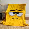 Yellow background with a sad cartoon face featuring droopy eyes and frown. for all seasons blanket lunch break throw gift