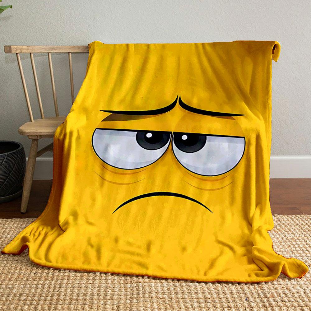 Yellow background with a sad cartoon face featuring droopy eyes and frown. for all seasons blanket lunch break throw gift