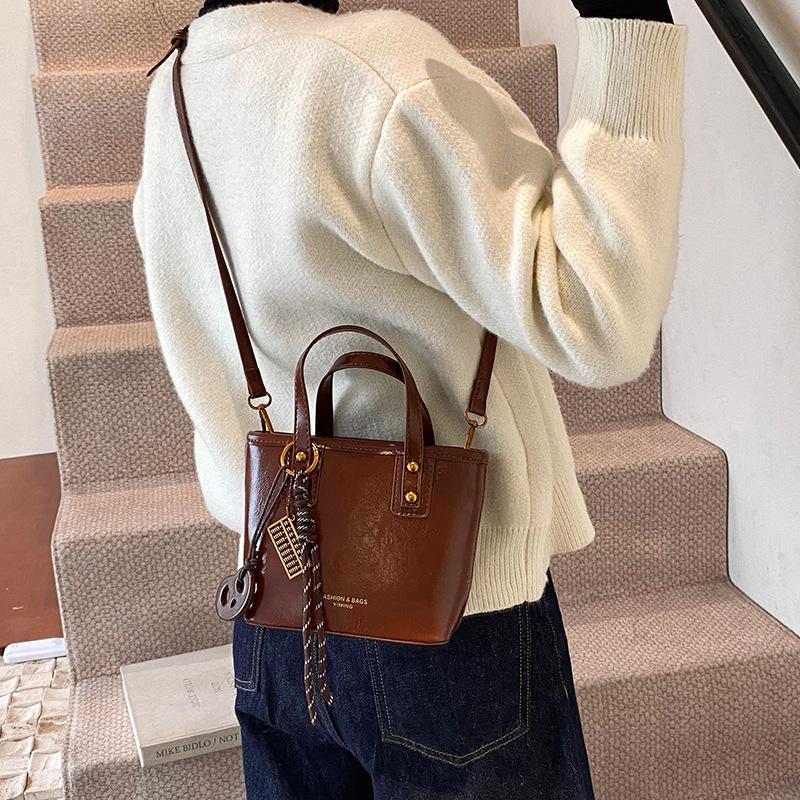 2025 New Bag Women's Bag Trendy Fashion Small Square Bag Popular Plush Pendant Shoulder Messenger Bag Premium Feeling Bag