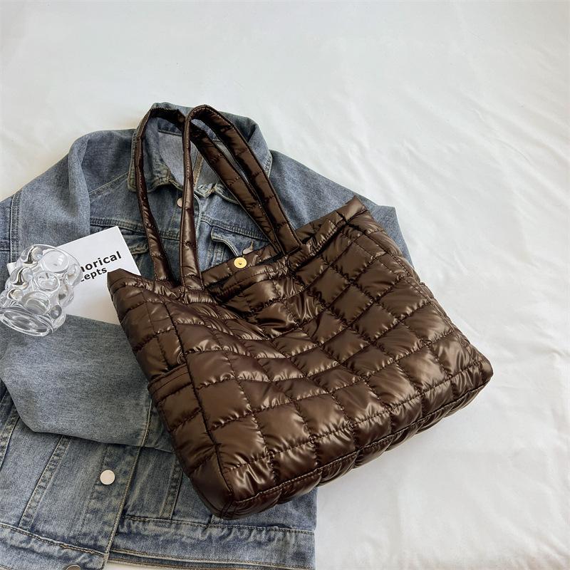 

2025 autumn space cotton bag, new Korean version of European and American style women s bag, large capacity single shoulder oblique span bag, tote bag