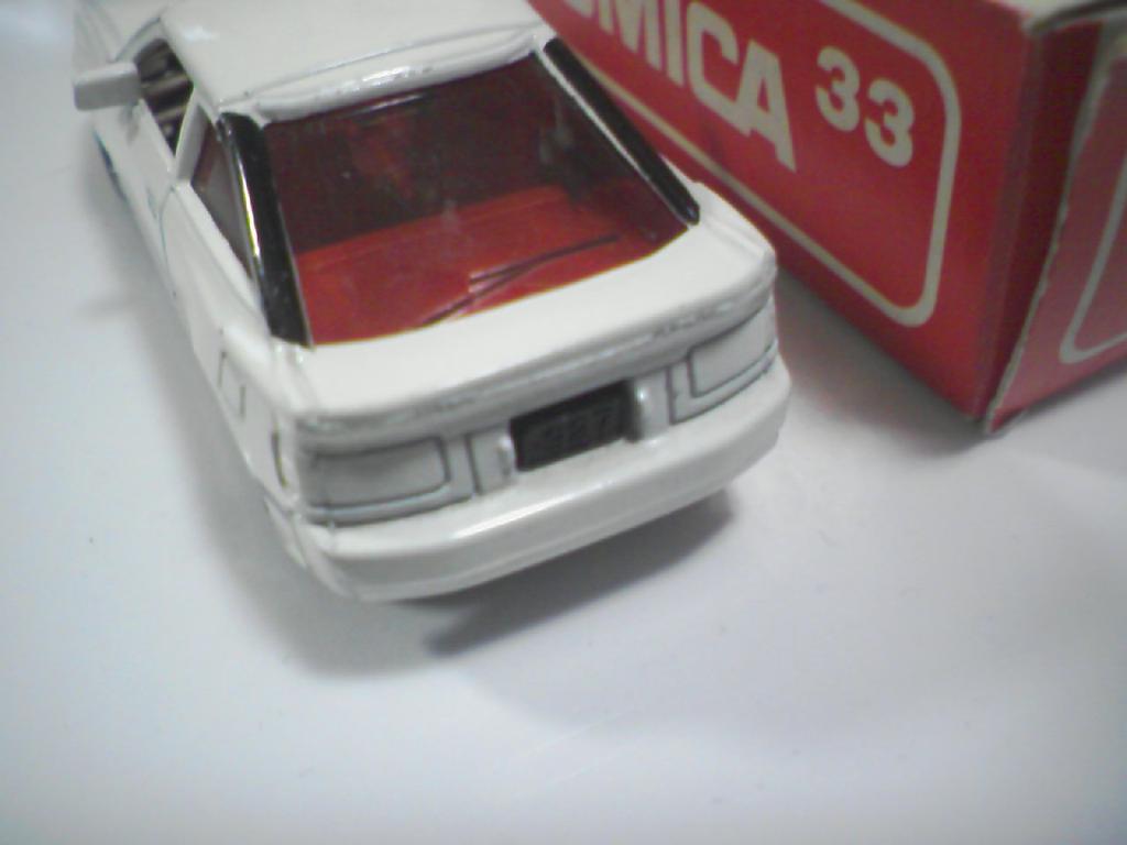 Tomica Made in Japan 33 Toyota Celica scale white with red TOMY logo 1/58