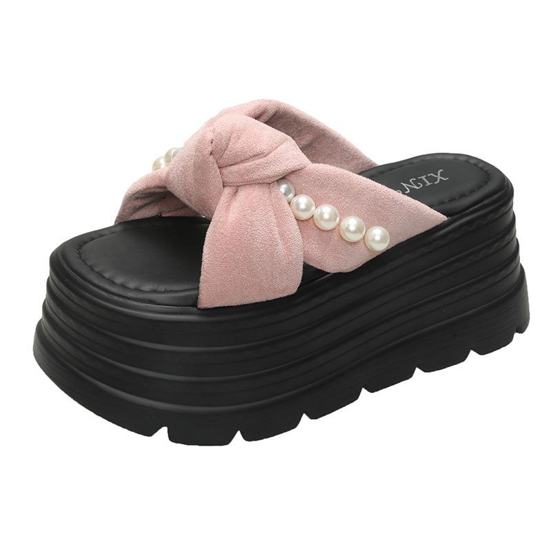Spring and summer new cool slippers muffin thick bottom small man height increase bow pearl super high thick bottom fashion drag