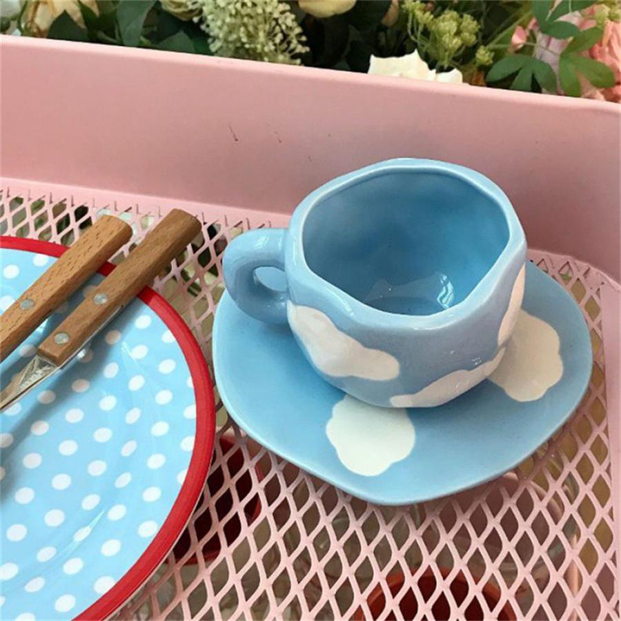 Creative small fresh underglaze color hand-painted white cloud coffee cup and saucer hand-squeezed irregular