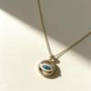 2025 Gold Plated Copper Necklace with Blue Zircon Eye Pendant and Oil Drop Relief Design for Women
