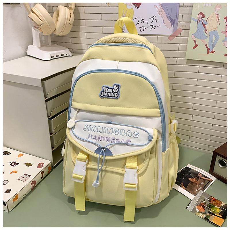 The new schoolbag is high-value, fresh and sweet, macaron-colored make-up bag, junior high school students, light travel, and large-capacity backpack.