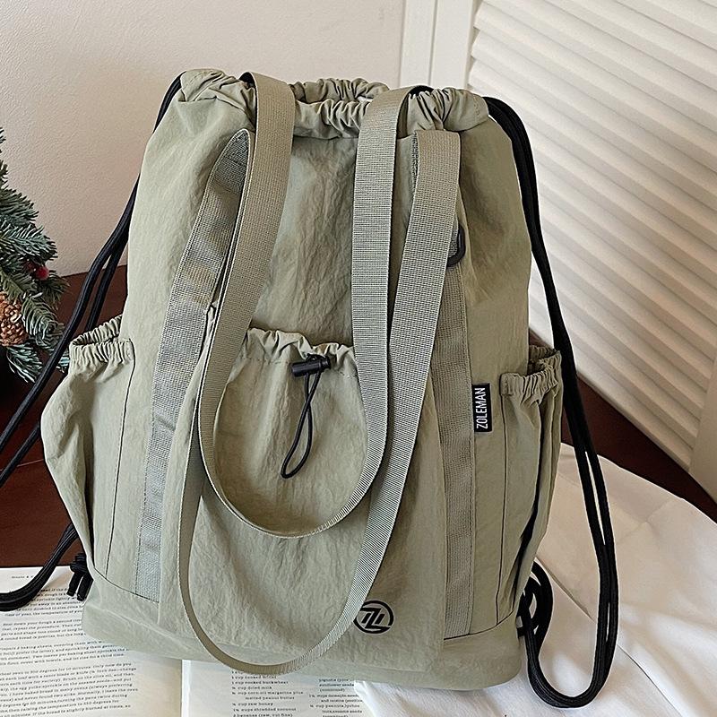 2026 Lightweight Large Capacity Backpack Simple New Outdoor Fashionable Cloth Bag Travel Shoulder Bag Casual School Bag