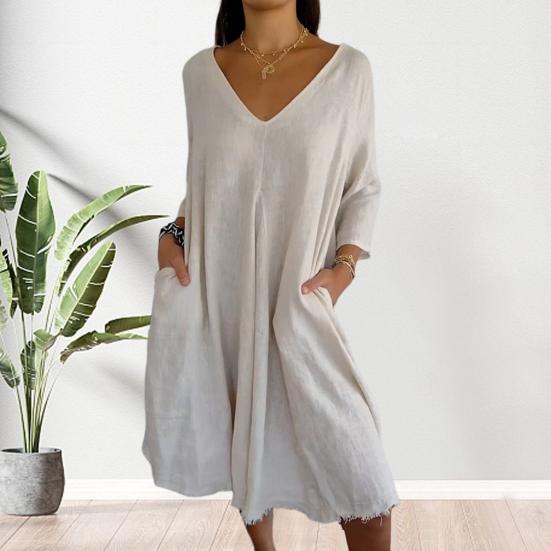 

Шея А-силуэта, рваный свободный подол, рукава три четверти, пуловер больших размеров, боковые карманы, длина до колен, повседневное платье миди