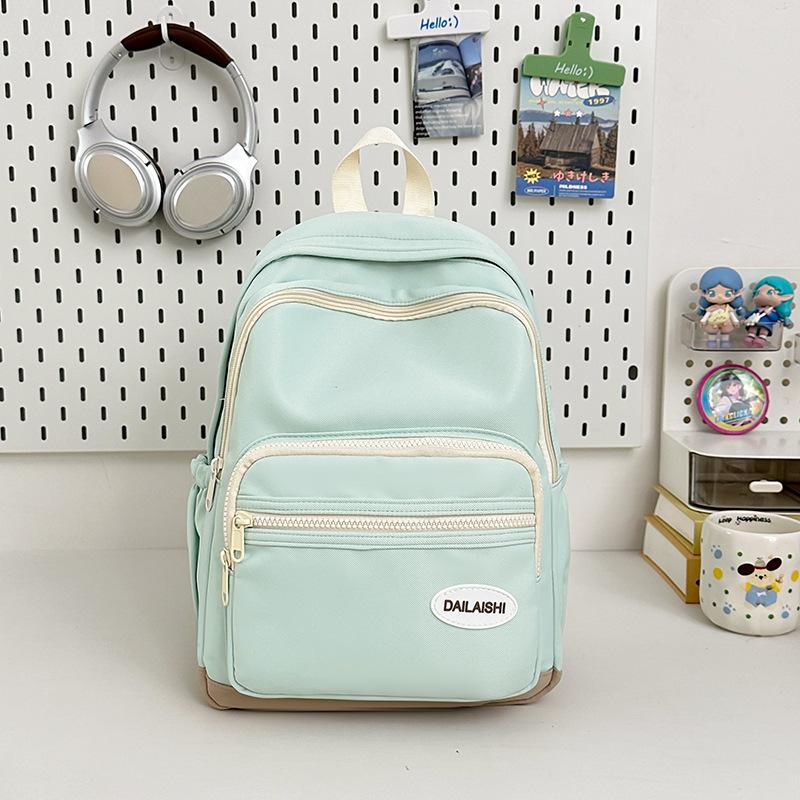 High-value Candy Color, Fresh and Sweet Backpack, Lightweight Make-up Class for Junior High School Students, and Large-capacity Backpack.
