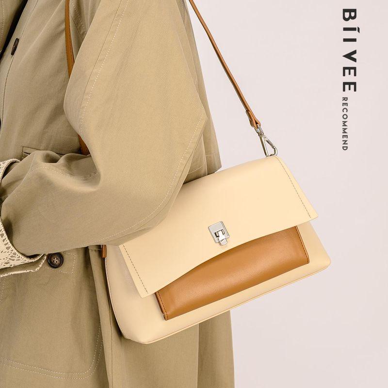 

Biivee Genuine Leather Women s Bag High-Grade Contrast Color Retro Underarm Bag 2025 New Fashion Commuter Shoulder Square Sling Bag Apricot with Brown