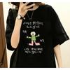 Women's T-shirt with A Illustration of A Character In A Green Top and Pink Pants, Quirky Style Korean Text About Life Attitude