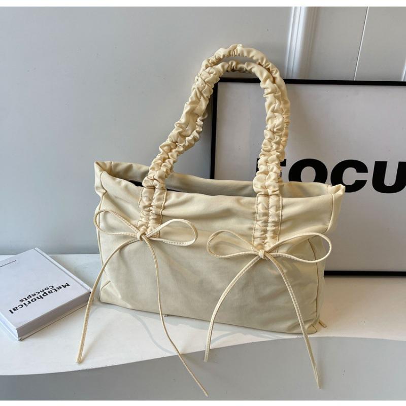 Fashion pleated niche design large capacity tote bag new bow women's bag one shoulder armpit bag