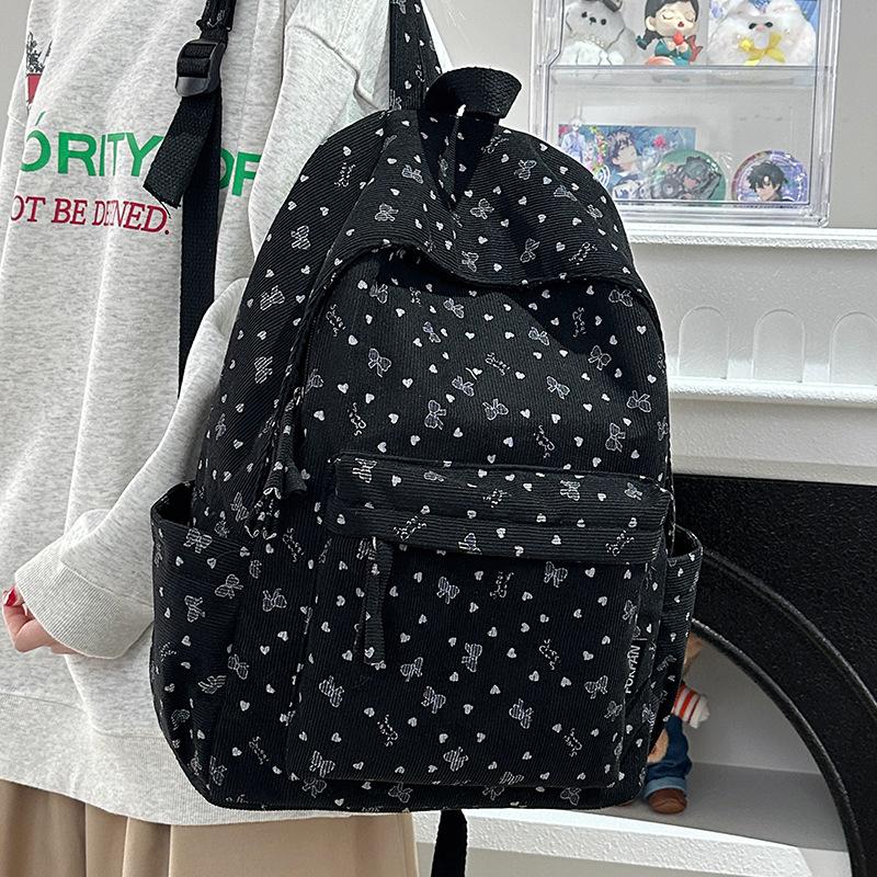 Schoolbag corduroy schoolbag junior high school girls college students autumn and winter backpack women travel lightweight 1011 new niche backpack