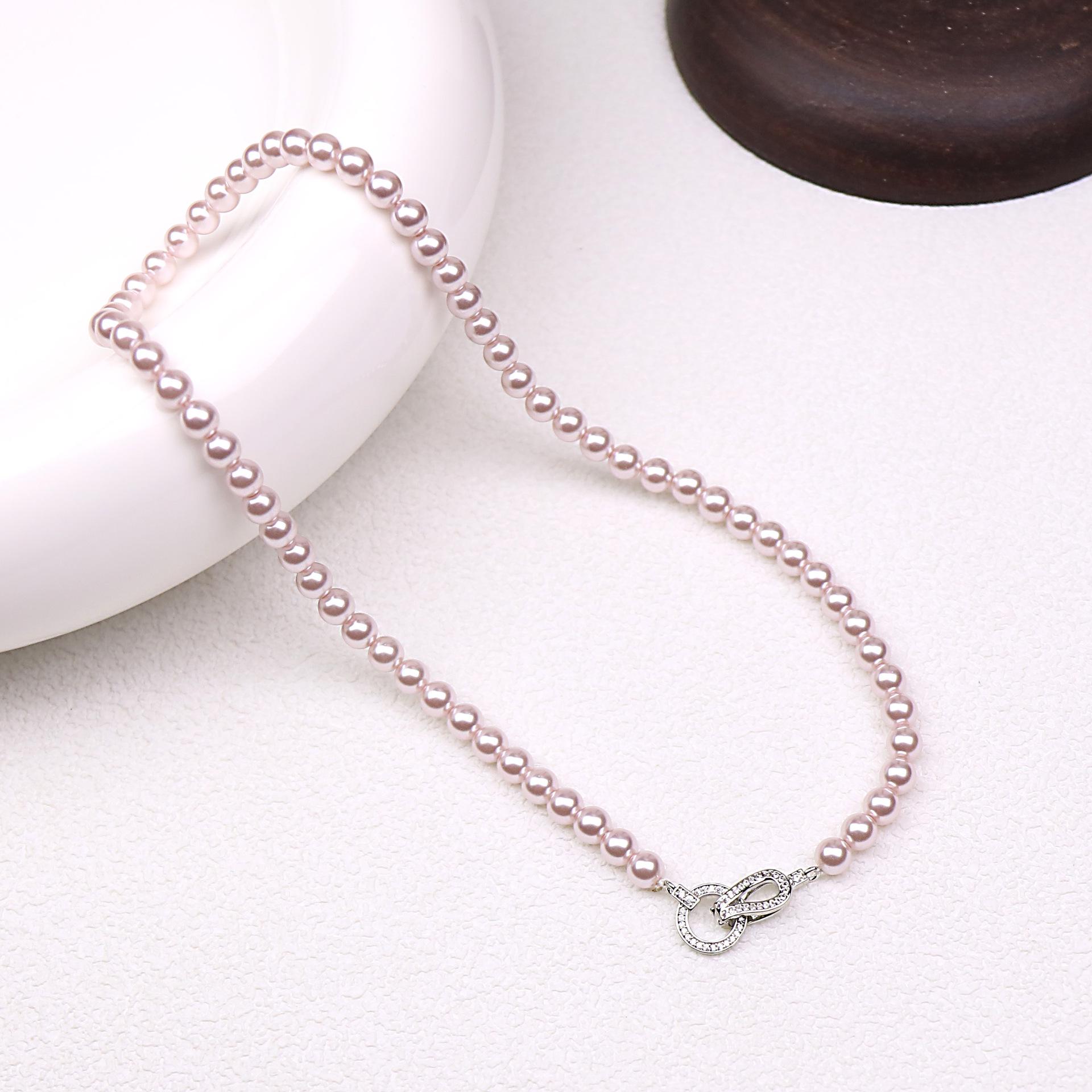 

Кольє-чокер з дрібних перлів з високим блиском для жінок у кольорі Manta Rose Purple – Елегантний та розкішний дизайн