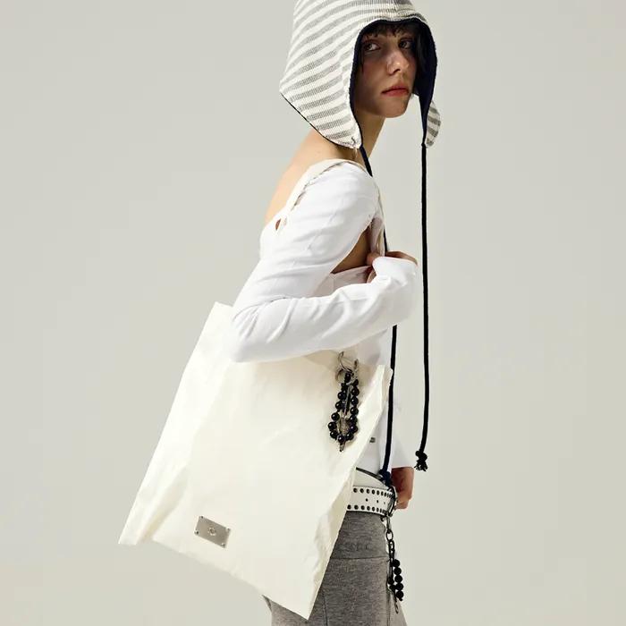SYMBOL GLOSSY ECO BAG [IVORY]