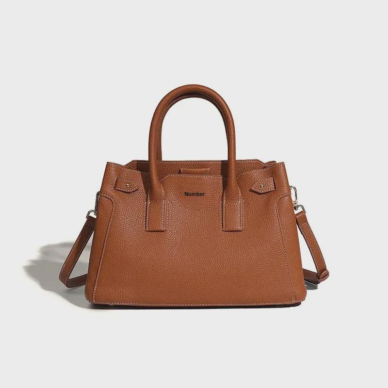 2025 Jarná Platinumová High-End Módna Kabelka - Dámsky Niche Dizajn, Všestranná Messenger Taška cez Jedno Rameno