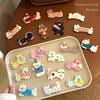 Cute cat puppy metal holder, mobile phone case, lazy holder, ultra-thin paste mobile phone holder, portable hard cartoon