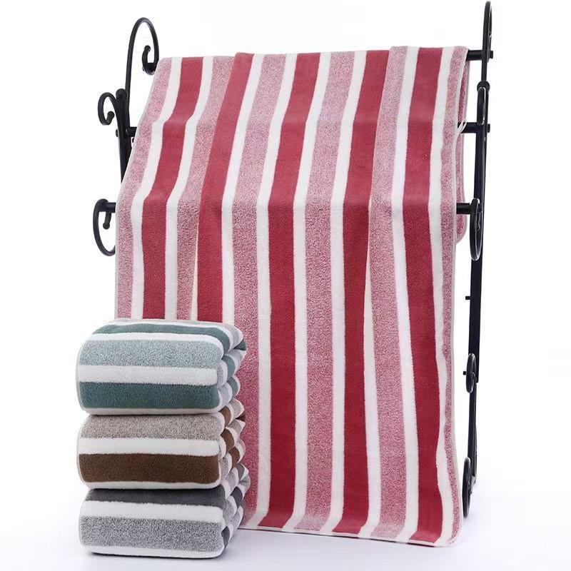 Large Coral Fleece Striped Bath & Beach Towel - Soft, Absorbent, and Perfect for Face and Body.