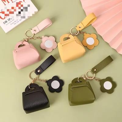 1ks Creative Pu Leather Women Přívěsek na klíče ve tvaru kabelky Pu Leather se zrcadlem Mini sluchátka Taška na klíče Peněženka na mince Roztomilá dívka s přívěskem na kabelku