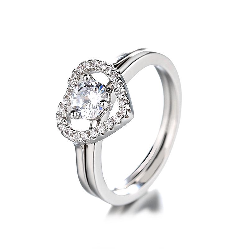 Zhenxin Heart Ring: Fashionable European & American Style with Dual-Wear Options, Featuring a Shimmering Zircon Stone and Simple, Elegant Design.