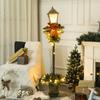 Christmas lantern with berries, pinecones & ribbon, LED lights, metal pole, 150 cm