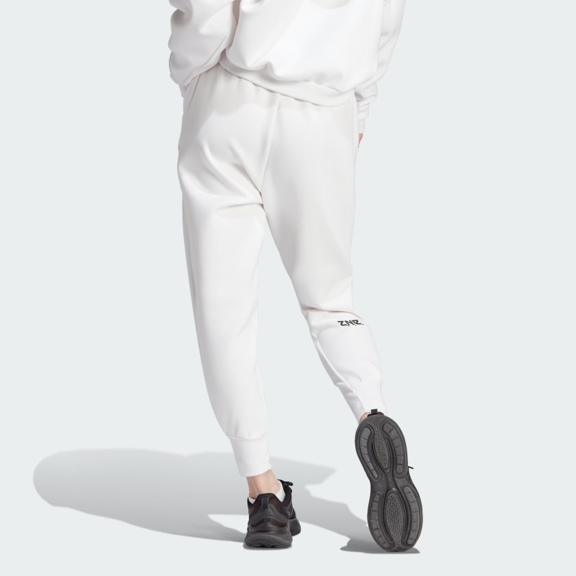 adidas ZNE. Řada SS23 Jednobarevné volné tepláky s manžetou Dámské spodní díly Bílé IN5140