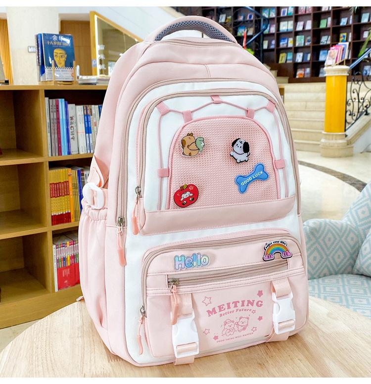 The new schoolbag is cute, small and fresh. The high-value schoolbag for high school students contrasts colors. The multi-compartment backpack