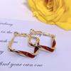 Hong Kong Style Elegant Red Ear Hoops: Retro Fashion Earrings with High-Quality, Timeless Charm.