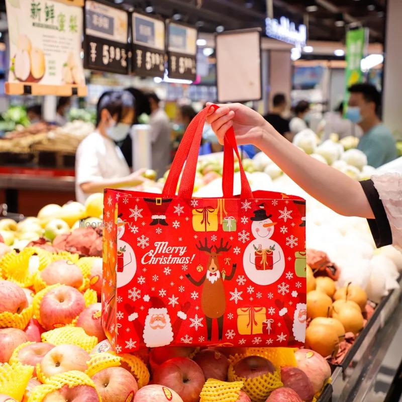 1PC New In Christmas Gift Bags Cartoon Cute Print Santa Elk Snowman Printing Non Woven Foldable Storage Handbag Party Supplies