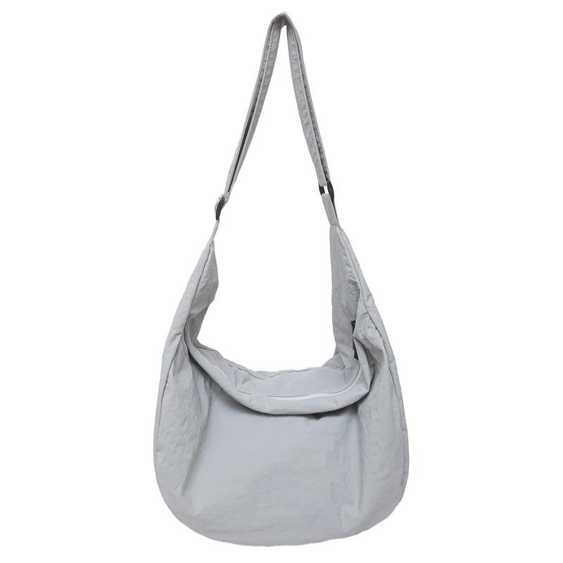 Lazy wind canvas bag new simple dumpling bag versatile women's shoulder bag large capacity commuter messenger bag