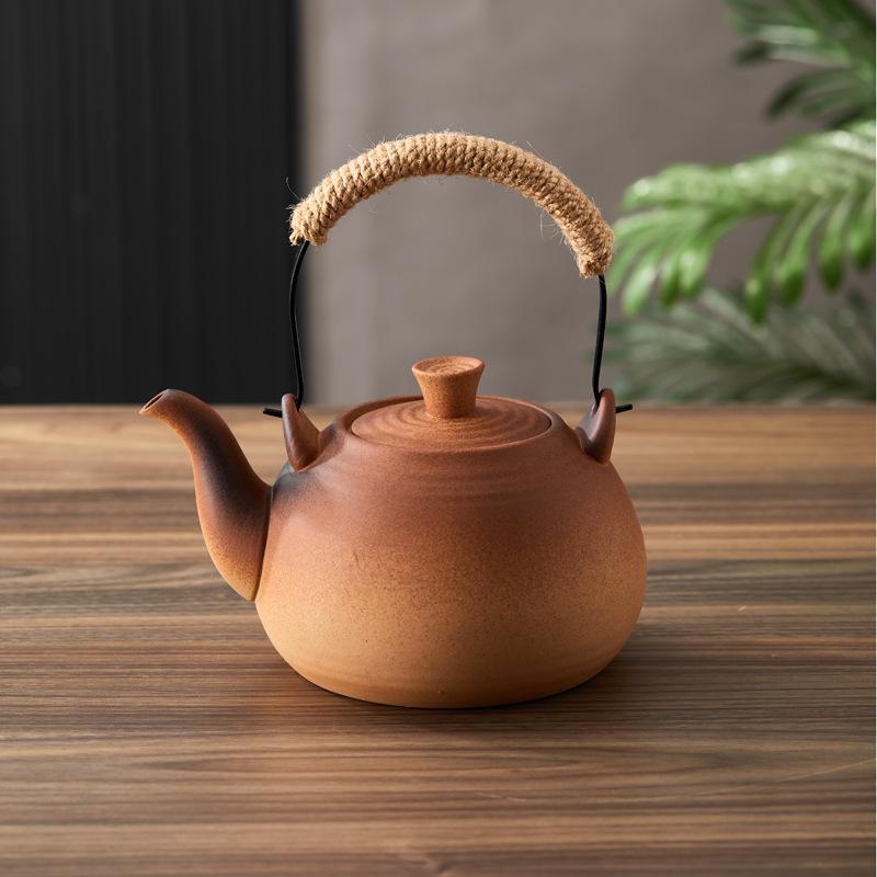 Ceramic Kung Fu Tea Set: Black Teapot with Side Handle and Charcoal Stove for Open Fire.