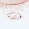 Adjustable Silver Fidget Ring: Anxiety Relief Spinner Jewelry with Three Small, Movable Beads and an Open Wire Wrap Design.