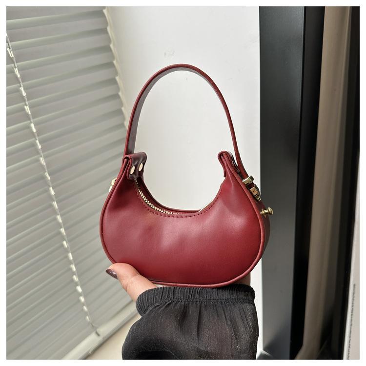 Niche design fashionable and cute ins mini bag female foreign style 2025 new portable crescent bag