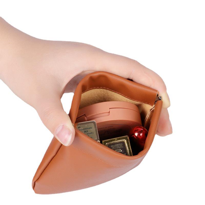 Shrapnel Automatic Closure Makeup & Earphone Travel Bag