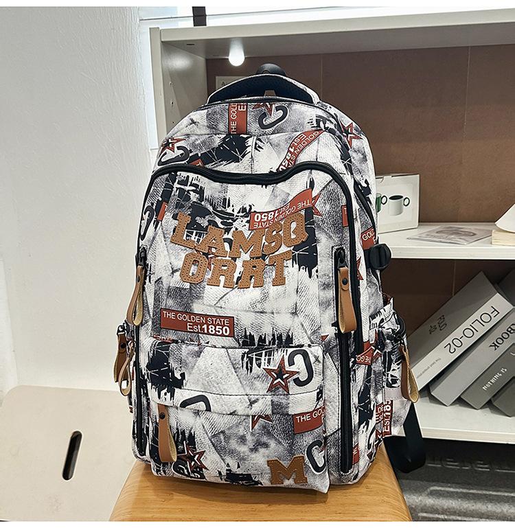 Schoolbag Trendy Cool Graffiti New Burden Reduction Schoolbag Junior High School Students Large Capacity Backpack High Value Lightweight Women's