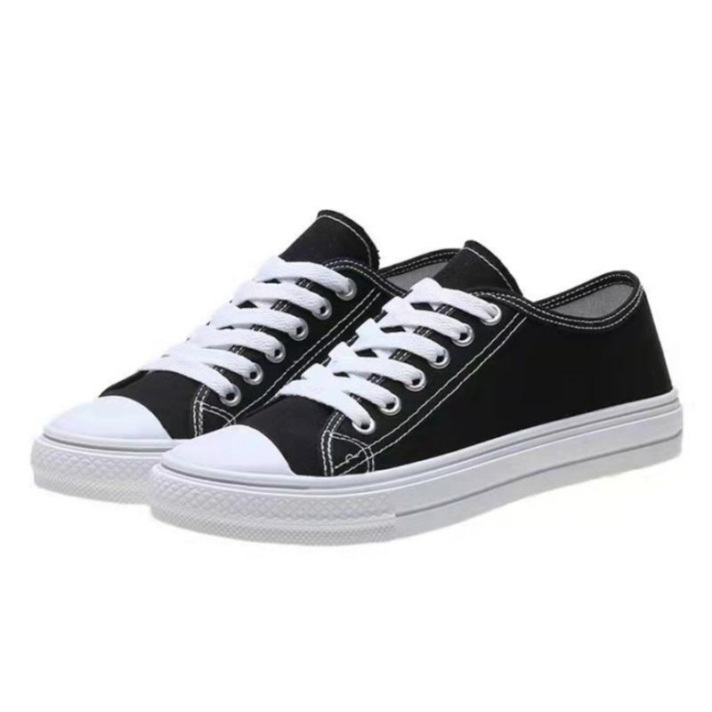 Buty płócienne wiosna i lato nowe niskie studenckie retro czarno-białe buty na desce buty codzienne