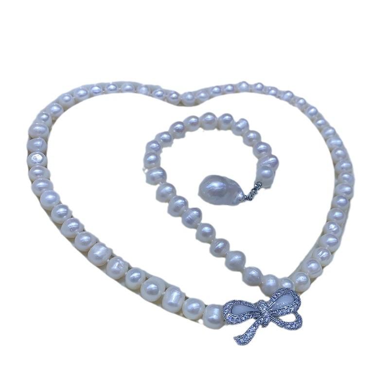 Elegant Bow-Style Freshwater Pearl Necklace - Near Round, Slightly Flawed, 60cm.