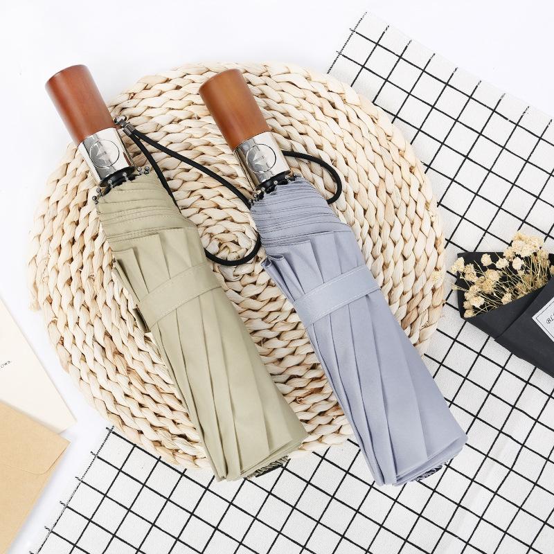 Ten-bone windproof umbrella three-fold automatic rain folding umbrella men's solid wood retro gentleman umbrella
