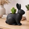 Modern decorative flowerpot in the shape of a rabbit in black