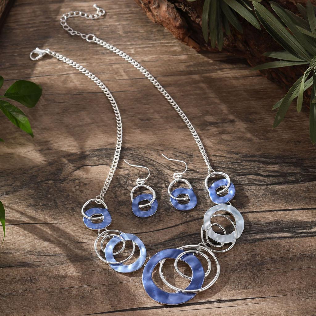 New color oil geometric ring earrings necklace set, fashionable and high-end women's neck chain earrings.