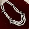 Elegant Layered Necklace with Faux Pearls and Bowknot Multi Layer Neckchain Fashionable Women Jewelry Wedding Accessory