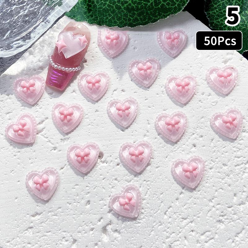 

50Pcs Pink Series Bow Heart Resin Nail Charms 3D Luminous Double Butterfly Peach Heart Sweet Wind Nail Art Decorations Diy Nails 5