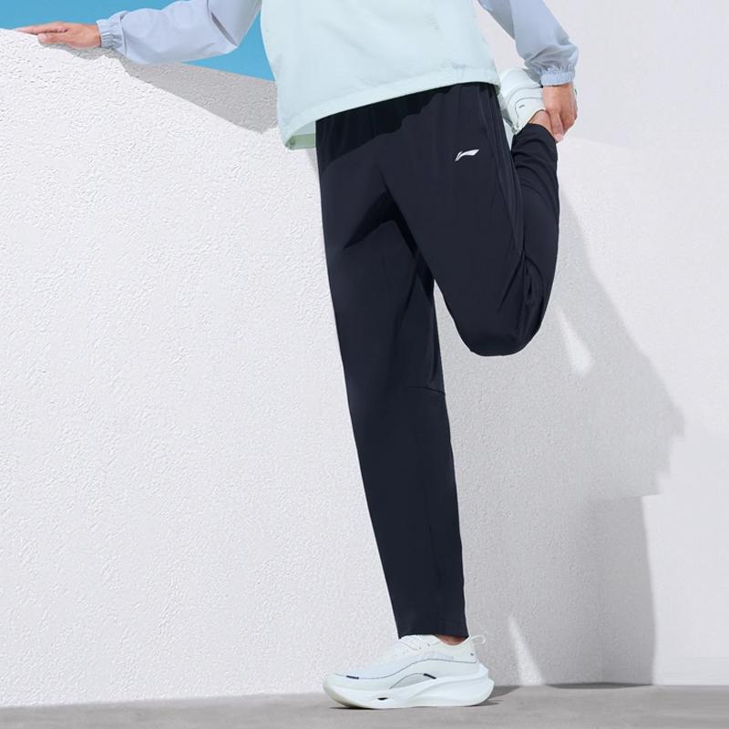 Li Ning Fitness Series Solid Color Mid Waist Comfortable Versatile Breathable Tapered Knit Sports Pants Men pants Black YYKU193-2
