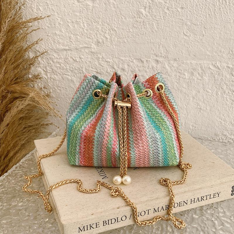 

Colorful Stripe Drawstring Design Shoulder Bags for Women Simple Ladies Chain Crossbody Bag Portable Female Woven Bucket Handbag рожевий