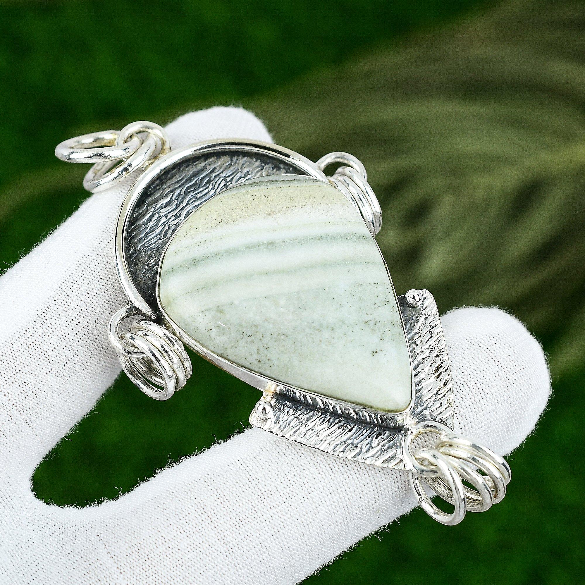 

Sterling Silver Pear Blue Rhodochrosite Gemstone Anniversary Art Deco Pendant