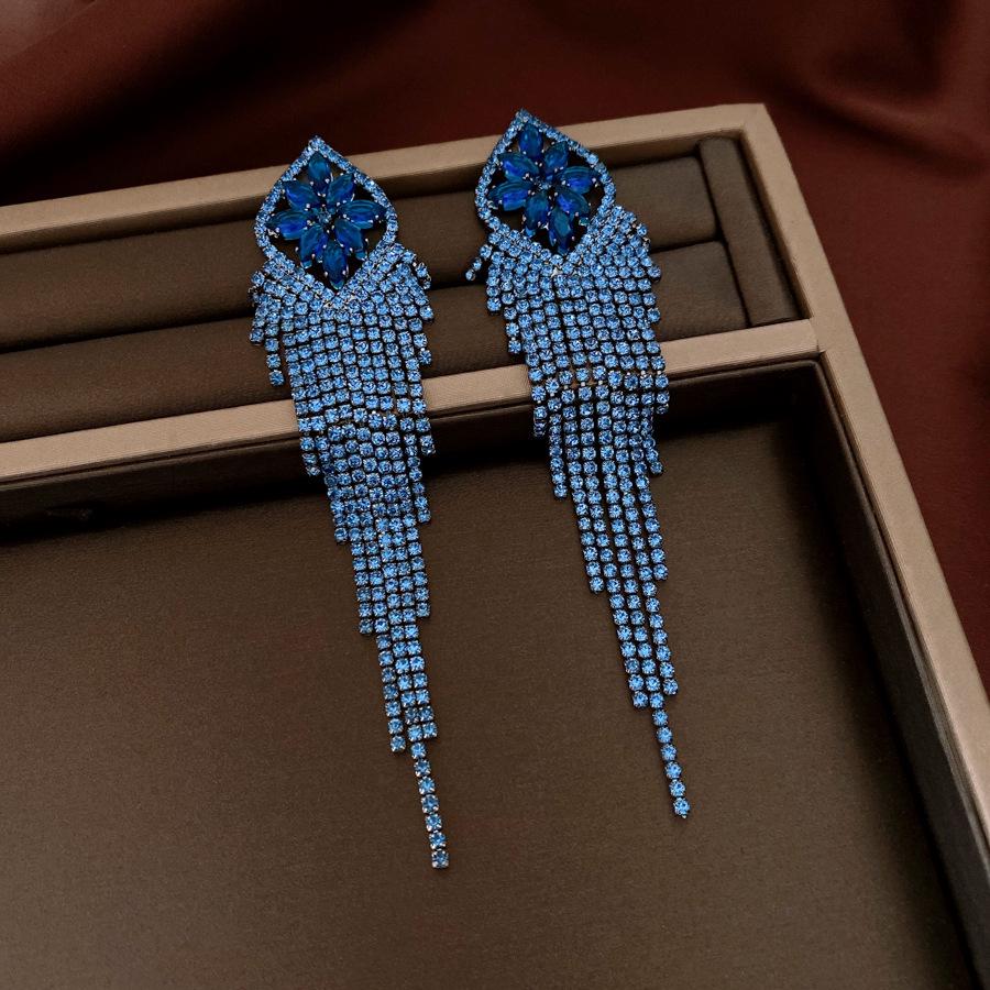 

Изысканные серьги-цветы Серебряные иглы с бриллиантами